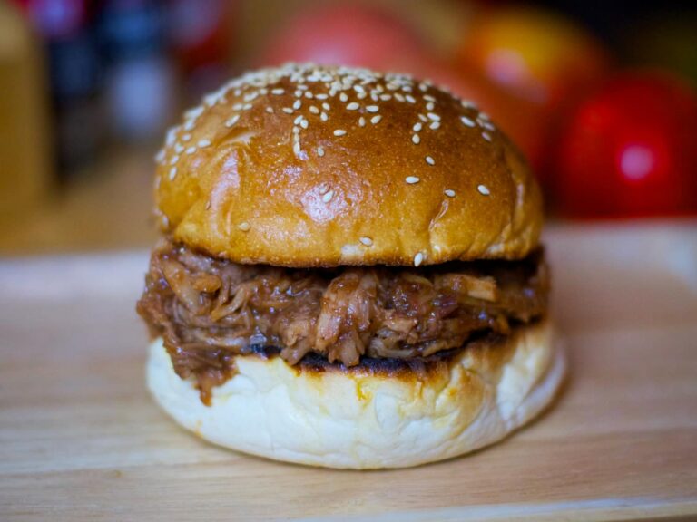 Unveiling The Charred Delight: Pulled Pork Burger At Satan’s Grill