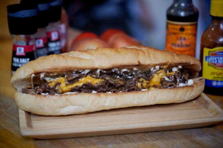 Embracing Culinary Temptation: The Legendary Philly Cheesesteak at Satan’s Grill